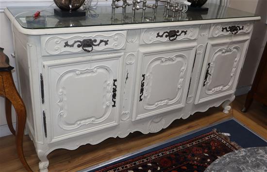A mid 18th century and later French white painted dresser base W.188cm